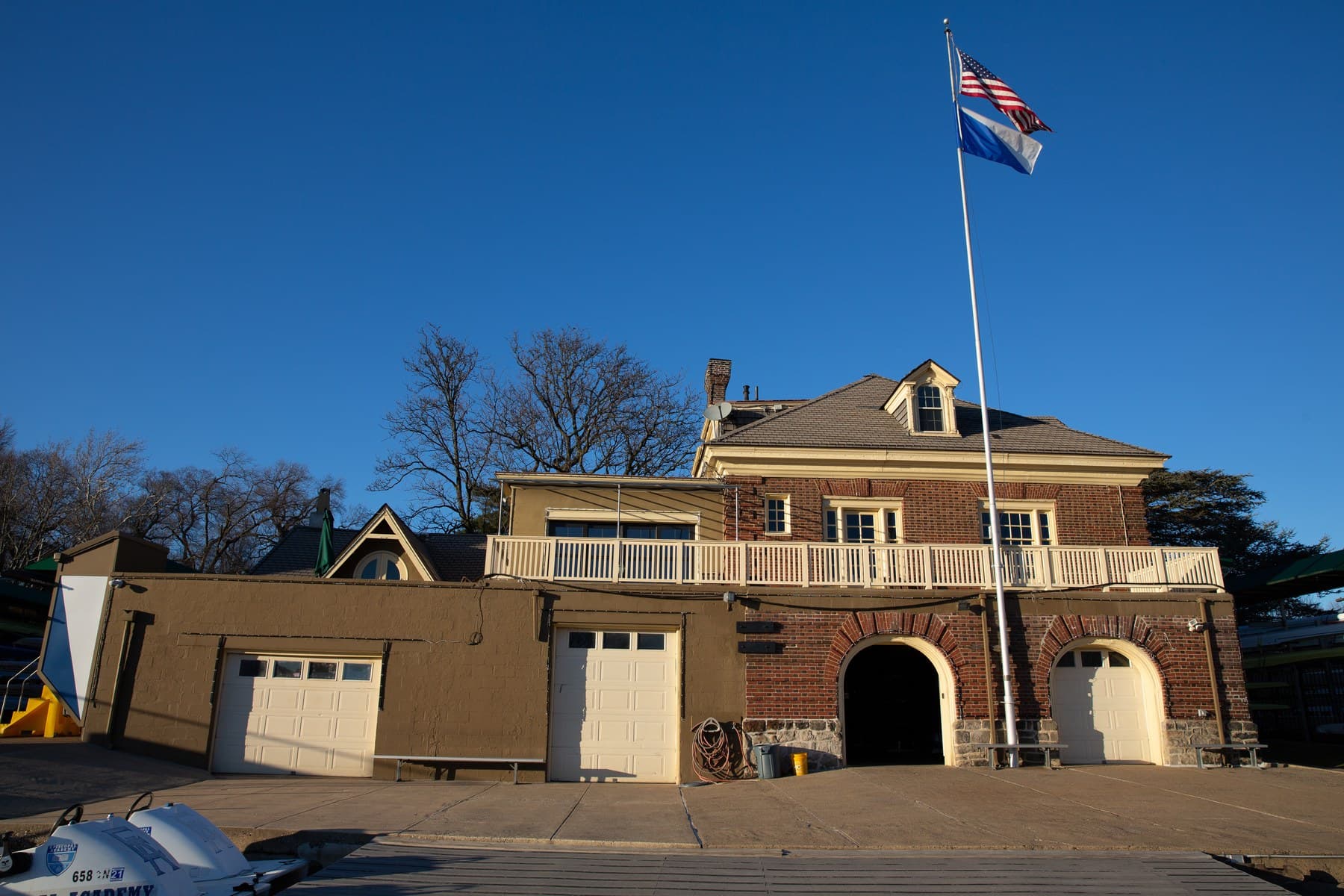 The Fairmount boathouse with its flags flying against a blue sky